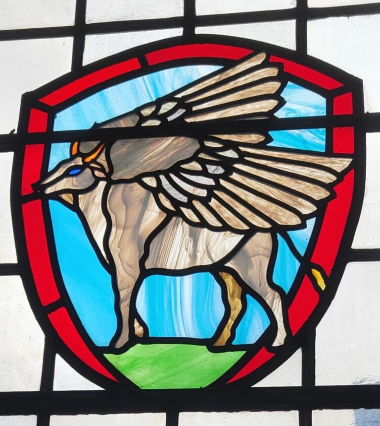 Bull with Wings stained glass window